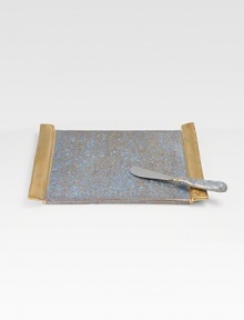A beautiful design inspired by the sunbaked Mediterranean shoreline, handcrafted in pristine porcelain and framed with 24k gold glaze along the handles. Includes a stainless steel cheese knife 13 X 8 Made in USA A beautiful design inspired by the sunbaked Mediterranean shoreline, handcrafted in pristine porcelain and framed with 24k gold glaze along the handles. Includes a stainless steel cheese knife 13 X 8 Made in USA