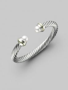 From the Cable Classics Collection. A signature Yurman cable of sterling silver, with lustrous white freshwater pearl end caps banded in 14k gold. White freshwater pearls Sterling silver and 14k yellow gold Cable, 7mm Diameter, about 2¼ Imported From the Cable Classics Collection. A signature Yurman cable of sterling silver, with lustrous white freshwater pearl end caps banded in 14k gold. White freshwater pearls Sterling silver and 14k yellow gold Cable, 7mm Diameter, about 2¼ Imported