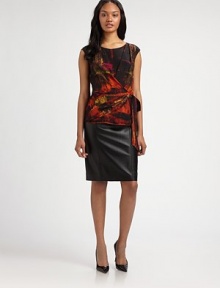 An exceptional take on the classic pencil skirt, this design is made from unbelievably soft lambskin leather.Back zipperBack ventFully linedAbout 23 longLambskin leatherDry clean by leather specialistImported Model shown is 5'10 (177cm) wearing US size 4. An exceptional take on the classic pencil skirt, this design is made from unbelievably soft lambskin leather.Back zipperBack ventFully linedAbout 23 longLambskin leatherDry clean by leather specialistImported Model shown is 5'10 (177cm) wearing US size 4.