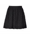 Stylish skirt of fine, black synthetic fiber - Elegant floral applique - Feminine A-line silhouette that moves into beautiful, soft folds - Sexy mini length - Gorgeous for evening events with a silk blouse and blazer or biker jacket and heels