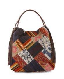 Peace, love and fashion- Channel your inner indie goddess with this Lucky Brand patchwork hobo. Leather tassels and a slouchy body make this bag perfect for relaxed weekend style. Peace, love and fashion- Channel your inner indie goddess with this Lucky Brand patchwork hobo. Leather tassels and a slouchy body make this bag perfect for relaxed weekend style.