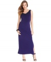 T Tahari's latest dress is evening-ready with its deep, rich hue and a subtly sexy slit at the front hem.