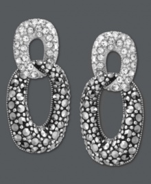 The missing link. Genevieve & Grace's sweetly sparkling post earrings are just the ticket to complete your look. Crafted in sterling silver, earrings feature marcasite and crystal accents. Approximate drop: 1/2 inch. The missing link. Genevieve & Grace's sweetly sparkling post earrings are just the ticket to complete your look. Crafted in sterling silver, earrings feature marcasite and crystal accents. Approximate drop: 1/2 inch.