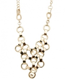 Lovely links. GUESS's intricate bib-style necklace adds the drama factor with its pretty gold tone mixed metal setting and chunky design. Approximate length: 16 inches + 2-inch extender. Approximate drop: 3-1/4 inches.