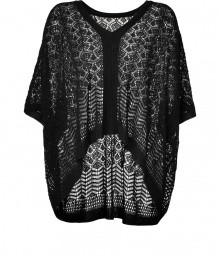 Perfect for layering over slim-fitting separates, Anna Suis oversized open-knit top lends a sultry edge to every outfit - V-neckline, elbow-length draped dolman sleeves - Oversized loose fit, shorter front - Wear with a tissue tee, leather leggings and suede booties Perfect for layering over slim-fitting separates, Anna Suis oversized open-knit top lends a sultry edge to every outfit - V-neckline, elbow-length draped dolman sleeves - Oversized loose fit, shorter front - Wear with a tissue tee, leather leggings and suede booties