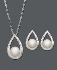 Add pristine sophistication with timeless pearl. Sleek teardrop set includes a necklace and earrings featuring cultured freshwater pearls (5-1/2 to 6 mm) with a dusting of diamond accents at the crown. Set crafted in smooth sterling silver. Approximate necklace length: 18 inches. Approximate pendant drop: 3/4 inch. Approximate earring diameter: 1/2 inch. Add pristine sophistication with timeless pearl. Sleek teardrop set includes a necklace and earrings featuring cultured freshwater pearls (5-1/2 to 6 mm) with a dusting of diamond accents at the crown. Set crafted in smooth sterling silver. Approximate necklace length: 18 inches. Approximate pendant drop: 3/4 inch. Approximate earring diameter: 1/2 inch.