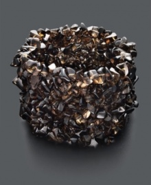 Channel your inner bohemian goddess with this chic stretch cuff. Features dozens of smoky quartz chips (300-350 ct. t.w.) for an earthy and organic look. Approximate length: 7-1/2 inches. Channel your inner bohemian goddess with this chic stretch cuff. Features dozens of smoky quartz chips (300-350 ct. t.w.) for an earthy and organic look. Approximate length: 7-1/2 inches.