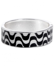 Channel the exoticism and energy of Brasil in Haskell's inspired skinny bangle. The Streets bangle features a black and white wavy print design, set in silver tone mixed metal with a hinge clasp. Approximate diameter: 2-1/2 inches. Approximate length: 8 inches. Item comes packaged in a turquoise gift box. Channel the exoticism and energy of Brasil in Haskell's inspired skinny bangle. The Streets bangle features a black and white wavy print design, set in silver tone mixed metal with a hinge clasp. Approximate diameter: 2-1/2 inches. Approximate length: 8 inches. Item comes packaged in a turquoise gift box.