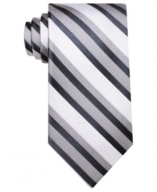 A clean classic stripe gives this Perry Ellis tie instant presence in your wardrobe. A clean classic stripe gives this Perry Ellis tie instant presence in your wardrobe.