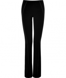 Flattering black pants with taped seams from Donna Karan - These curve-hugging pants make a seamless transition from office to evening - Slim fit, side-seaming detail, slightly flared leg - Style with an oversized cashmere pullover, a draped leather jacket, and platforms