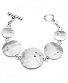 Forever hip. This versatile Kenneth Cole New York bracelet features hammered silvertone mixed metal disks accented with tiny crystals. Bar and toggle closure. Approximate length: 8 inches. Forever hip. This versatile Kenneth Cole New York bracelet features hammered silvertone mixed metal disks accented with tiny crystals. Bar and toggle closure. Approximate length: 8 inches.