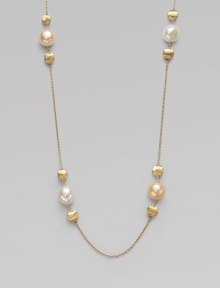 From the Africa Pearl Collection. A delicate link chain with 18k gold and cultured freshwater pearl stations for a look that's both feminine and unique. 18k goldRound white and champagne cultured freshwater pearlsLobster clasp closureLength, about 36Made in Italy From the Africa Pearl Collection. A delicate link chain with 18k gold and cultured freshwater pearl stations for a look that's both feminine and unique. 18k goldRound white and champagne cultured freshwater pearlsLobster clasp closureLength, about 36Made in Italy