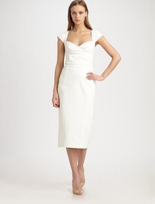 This ultra-feminine dress features a unique cross-over belt, fastened in back with a bright grosgrain bow.Sweetheart necklineCap sleevesCross-over wrap belt with contrast back tiesBack slitConcealed back zipFully linedAbout 29 from natural waist56% cotton/38% polyester/6% spandexDry cleanMade in USA of imported fabricModel shown is 5'9½ (176cm) wearing US size 4. 