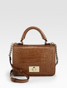 A chic boxy frame in luxurious patent crocodile embossed leather.Top handle, 4½ dropDetachable adjustable chain and patent crocodile embossed leather shoulder strap, 20-22½ dropTurnlock flap closureOne inside zip pocketTwo inside open pocketsFully lined9½W X 7H X 3½DImported A chic boxy frame in luxurious patent crocodile embossed leather.Top handle, 4½ dropDetachable adjustable chain and patent crocodile embossed leather shoulder strap, 20-22½ dropTurnlock flap closureOne inside zip pocketTwo inside open pocketsFully lined9½W X 7H X 3½DImported