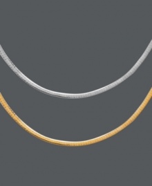 A necklace to fit your changing moods. This reversible omega necklace features a 14k gold side and a sterling silver side so you can mix and match with all your jewelry. Approximate length: 16-19 inches. A necklace to fit your changing moods. This reversible omega necklace features a 14k gold side and a sterling silver side so you can mix and match with all your jewelry. Approximate length: 16-19 inches.