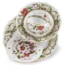 Flower Fantasy bread and butter plates by Versace by Rosenthal. Derived from one of the fashion houses archival prints, this exuberant collection evokes the romance and promise of spring as hand-painted renderings of meadow herbs, sweet-scented flowers and even four-leaf clovers intermingle in a subtle yet lively design. Flower Fantasy bread and butter plates by Versace by Rosenthal. Derived from one of the fashion houses archival prints, this exuberant collection evokes the romance and promise of spring as hand-painted renderings of meadow herbs, sweet-scented flowers and even four-leaf clovers intermingle in a subtle yet lively design.