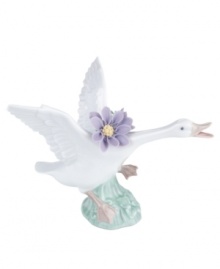 Taking flight with big purple blossoms in tow, this leaping duck captures the grace of nature in lustrous Lladro porcelain. Taking flight with big purple blossoms in tow, this leaping duck captures the grace of nature in lustrous Lladro porcelain.