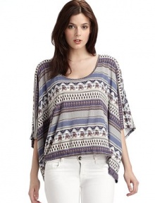 Exotic elephant patterns highlight this oversized style with stylishly drapey sleeves.Scoop neckline Short sleeves About 26 from shoulder to hem Modal; machine wash Imported Exotic elephant patterns highlight this oversized style with stylishly drapey sleeves.Scoop neckline Short sleeves About 26 from shoulder to hem Modal; machine wash Imported