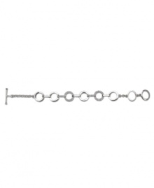 Let fashion come full circle. This delightful toggle bracelet by Swarovski features pave-set crystals in a mixed metal setting. Approximate length: 7 inches. Let fashion come full circle. This delightful toggle bracelet by Swarovski features pave-set crystals in a mixed metal setting. Approximate length: 7 inches.