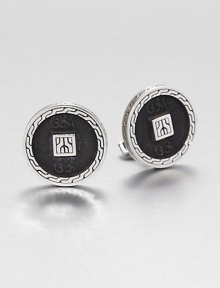 From the Classic Chain Collection. With the look of ancient coins, discs of blackened silver sit handsomely within carved settings of polished sterling silver.Sterling silverSwivel backMade in Bali From the Classic Chain Collection. With the look of ancient coins, discs of blackened silver sit handsomely within carved settings of polished sterling silver.Sterling silverSwivel backMade in Bali