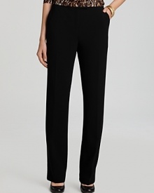 Exude classic style in these must-have black pants by Jones New York Collection. Exude classic style in these must-have black pants by Jones New York Collection.