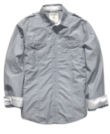 Military-inspired details like epaulets and chest pockets add a rugged feel to this sleekly striped shirt from Guess. Military-inspired details like epaulets and chest pockets add a rugged feel to this sleekly striped shirt from Guess.