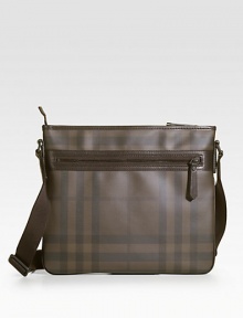 A slim-line urban case for the man on the go, shaded with iconic checks and crafted with durable, long-lasting wear.Adjustable crossbody strapZip closureExterior zip pocket13½W X 12½H X 1DPVCMade in Italy A slim-line urban case for the man on the go, shaded with iconic checks and crafted with durable, long-lasting wear.Adjustable crossbody strapZip closureExterior zip pocket13½W X 12½H X 1DPVCMade in Italy