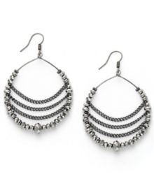 Whip your look into shape with c.A.K.e. by Ali Khan unique chains and beads hoop drop earrings. Crafted in hematite tone mixed metal with faceted glass rondelles (3, 4, and 6 mm). Approximate drop: 2-3/8 inches.