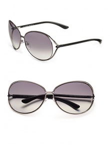 Round modified metal frames with open-end lens and tubular temples. Available in shiny gunmetal with grey gradient lens.100% UV protection Made in Italy Round modified metal frames with open-end lens and tubular temples. Available in shiny gunmetal with grey gradient lens.100% UV protection Made in Italy