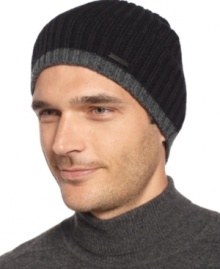 Calvin Klein tips this hat with charcoal, adding a modernist edge to the basic beanie.