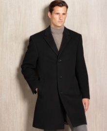 The perfect topcoat, plain and simple: Calvin Klein's Plaza, a sparingly detailed overcoat tailored in a traditional three-button silhouette. The perfect topcoat, plain and simple: Calvin Klein's Plaza, a sparingly detailed overcoat tailored in a traditional three-button silhouette.