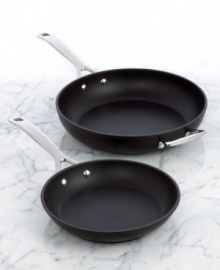 The workhorse of any working kitchen, Le Creuset's exceptional deep skillet puts in an impressive performance for every meal. Forged from hard-anodized aluminum, then impact bonded, this pan is harder than stainless steel and features a healthy, PFOA-free nonstick coating, both inside and out. 10-year warranty. The workhorse of any working kitchen, Le Creuset's exceptional deep skillet puts in an impressive performance for every meal. Forged from hard-anodized aluminum, then impact bonded, this pan is harder than stainless steel and features a healthy, PFOA-free nonstick coating, both inside and out. 10-year warranty.