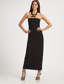 A slender column in silky matte jersey with a striking ornament of bold golden rings and ties at the neck.Bandeau necklineHalter tiesPleated draped panel at bodicePullover stylingAbout 52 from shoulder to hem70% rayon/27% polyester/3% elastaneDry cleanImportedModel shown is 5'9½ (176cm) wearing US size 4. A slender column in silky matte jersey with a striking ornament of bold golden rings and ties at the neck.Bandeau necklineHalter tiesPleated draped panel at bodicePullover stylingAbout 52 from shoulder to hem70% rayon/27% polyester/3% elastaneDry cleanImportedModel shown is 5'9½ (176cm) wearing US size 4.