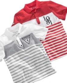 Classic sports style in this polo shirt from Guess will pull his outfit together and keep him comfortable all day.