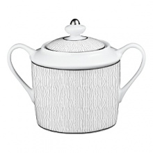 An icon of grand rich tradition of excellence, Bernardaud embodies one of the most innovative spirits among French luxury houses today. A trendsetter in design, it's porcelain collections are characterized by original forms, capturing the essence of their time. Inspired by distant deserts and drawn from timeless landscapes, Dune still bears the caress of the wind on the sand on its wide borders. With its pearly reflection and its subtle texture, the Limoges porcelain vibrates with a soft light. Based in white, classic, yet modern, Dune will forever dress your table with style. An icon of grand rich tradition of excellence, Bernardaud embodies one of the most innovative spirits among French luxury houses today. A trendsetter in design, it's porcelain collections are characterized by original forms, capturing the essence of their time. Inspired by distant deserts and drawn from timeless landscapes, Dune still bears the caress of the wind on the sand on its wide borders. With its pearly reflection and its subtle texture, the Limoges porcelain vibrates with a soft light. Based in white, classic, yet modern, Dune will forever dress your table with style.