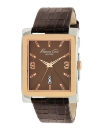 An incomparable blend of a robust facade and an elegant center, by Kenneth Cole New York. Watch crafted of brown croc-embossed leather strap and rectangular rose-gold plated stainless steel case. Brown dial features rose-gold tone applied numerals at three and nine o'clock, stick indices, date window at six o'clock, rose-gold tone three hands and logo at twelve o'clock. Quartz movement. Water resistant to 30 meters. Limited lifetime warranty.