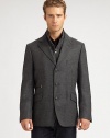 Inspired from the traditional look and feel of checked tweed, this three-button jacket is shaped in the supreme softness of a wool and cashmere blend, featuring a zip-out front vest panel and an additional front ticket pocket.Button-frontNotch lapelChest welt, waist flap pocketsSide vents94% wool/6% cashmereDry cleanMade in Italy