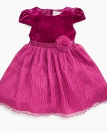 A floral rosette adds a flourish of pretty pink style to this darling dress from Sweet Heart Rose. (Clearance) A floral rosette adds a flourish of pretty pink style to this darling dress from Sweet Heart Rose. (Clearance)