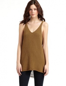 THE LOOKV-necklinePullover styleSleevelessSweater styleRoll hemExposed back with fringe detailTHE FITAbout 30 from shoulder to hemTHE MATERIAL67% cotton/33% nylonCARE & ORIGINDry clean ImportedModel shown is 5'9½ (176cm) wearing US size Small. THE LOOKV-necklinePullover styleSleevelessSweater styleRoll hemExposed back with fringe detailTHE FITAbout 30 from shoulder to hemTHE MATERIAL67% cotton/33% nylonCARE & ORIGINDry clean ImportedModel shown is 5'9½ (176cm) wearing US size Small.