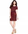 Calvin Kleins put a fresh spin on stripes, outfitting this petite dress with horizontal bands at the bodice and vertical through the skirt. The look is tied together with a drawstring waist and sleek zippered pockets.