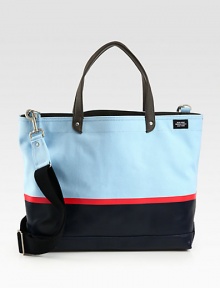 Tote your belongings around town in style this season with this structured canvas bag, dipped in rubber latex for added protection, in contrasting colors that lends a nautical feel to a contemporary design.Double top handlesAdjustable shoulder strapInterior zip pocketCanvas14W x 16H x 6DImported Tote your belongings around town in style this season with this structured canvas bag, dipped in rubber latex for added protection, in contrasting colors that lends a nautical feel to a contemporary design.Double top handlesAdjustable shoulder strapInterior zip pocketCanvas14W x 16H x 6DImported