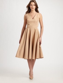 Lustrous, silky faille, tailored in an ultra-feminine silhouette and accented with an alluring back cutout detail.V necklineSleevelessFull skirtCutout back detailConcealed side zipAbout 27 from natural waist56% polyester/44% silkDry cleanMade in ItalyModel shown is 5'11 (180cm) wearing US size 4. Lustrous, silky faille, tailored in an ultra-feminine silhouette and accented with an alluring back cutout detail.V necklineSleevelessFull skirtCutout back detailConcealed side zipAbout 27 from natural waist56% polyester/44% silkDry cleanMade in ItalyModel shown is 5'11 (180cm) wearing US size 4.