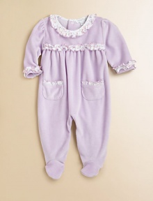 Crafted in buttery soft velour with charming ruffle trim and lavender print, this precious one-piece is as pretty as baby.Ruffled crewneckLong sleeves with ruffled cuffsBack snapsPatch pocketsBottom snaps80% cotton/20% polyesterMachine washImported Please note: Number of snaps may vary depending on size ordered. Crafted in buttery soft velour with charming ruffle trim and lavender print, this precious one-piece is as pretty as baby.Ruffled crewneckLong sleeves with ruffled cuffsBack snapsPatch pocketsBottom snaps80% cotton/20% polyesterMachine washImported Please note: Number of snaps may vary depending on size ordered.