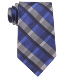 Need a simple solution for your wardrobe of solids? Suit up with this plaid tie from Calvin Klein. Need a simple solution for your wardrobe of solids? Suit up with this plaid tie from Calvin Klein.