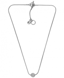 Polished to a T. Subtle shine and polished silver create a versatile style that blends with any look. Michael Kors' glass fireball pendant set in silver tone mixed metal with a toggle clasp and logo charm accents. Approximate length: 16 inches. Approximate drop: 1/4 inch. Polished to a T. Subtle shine and polished silver create a versatile style that blends with any look. Michael Kors' glass fireball pendant set in silver tone mixed metal with a toggle clasp and logo charm accents. Approximate length: 16 inches. Approximate drop: 1/4 inch.