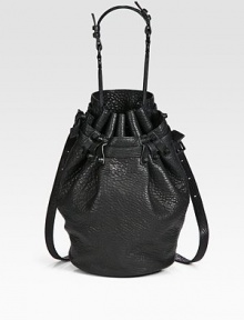 Gorgeous pebble-grain leather in a roomy drawstring bucket silhouette finished with chic matte hardware and dual strap options.Top handle, 8¼ dropDetachable adjustable crossbody strap, 14½-20¼ dropDrawstring closureOne outside open pocketProtective metal feetOne inside zip pocketTwo inner compartmentsFully lined11½W X 8H X 5DImported Gorgeous pebble-grain leather in a roomy drawstring bucket silhouette finished with chic matte hardware and dual strap options.Top handle, 8¼ dropDetachable adjustable crossbody strap, 14½-20¼ dropDrawstring closureOne outside open pocketProtective metal feetOne inside zip pocketTwo inner compartmentsFully lined11½W X 8H X 5DImported