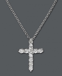 Show your faith in style! Effy Collection's symbolic and sparkling cross pendant features seamless rows of round-cut diamonds (1/5 ct. t.w.). Set in polished 14k white gold. Approximate length: 18 inches. Approximate drop: 1/2 inch. Show your faith in style! Effy Collection's symbolic and sparkling cross pendant features seamless rows of round-cut diamonds (1/5 ct. t.w.). Set in polished 14k white gold. Approximate length: 18 inches. Approximate drop: 1/2 inch.