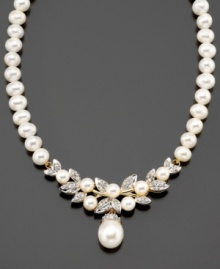 A stunning addition to your evening look. This necklace features cultured freshwater pearl (5 mm, 5-1/2 mm and 9 mm) and round-cut diamond (3/8 ct. t.w.) set in 14k gold. Approximate length: 17 inches. A stunning addition to your evening look. This necklace features cultured freshwater pearl (5 mm, 5-1/2 mm and 9 mm) and round-cut diamond (3/8 ct. t.w.) set in 14k gold. Approximate length: 17 inches.