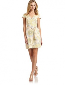 THE LOOKCharming floral paisley printWrap-front styleSurplice v-necklineCap sleevesSelf sash ties around the waistTHE FITAbout 35 from shoulder to hemTHE MATERIAL92% polyester/8% spandex CARE & ORIGINDry cleanImportedModel shown is 5'9½ (176cm) wearing US size Small. THE LOOKCharming floral paisley printWrap-front styleSurplice v-necklineCap sleevesSelf sash ties around the waistTHE FITAbout 35 from shoulder to hemTHE MATERIAL92% polyester/8% spandex CARE & ORIGINDry cleanImportedModel shown is 5'9½ (176cm) wearing US size Small.
