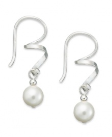 Bohemian bliss. Swirls of sterling silver perfectly highlight cultured freshwater pearls (7 mm) on these pretty Jody Coyote earrings. Approximate drop: 1-1/8 inches. Bohemian bliss. Swirls of sterling silver perfectly highlight cultured freshwater pearls (7 mm) on these pretty Jody Coyote earrings. Approximate drop: 1-1/8 inches.